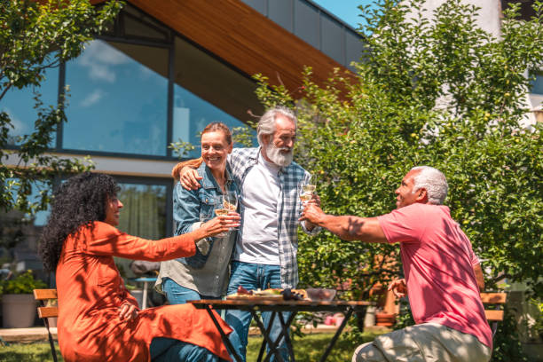istock Backyard Joy: Cheerful Seniors' Summer Picnic 1601038385