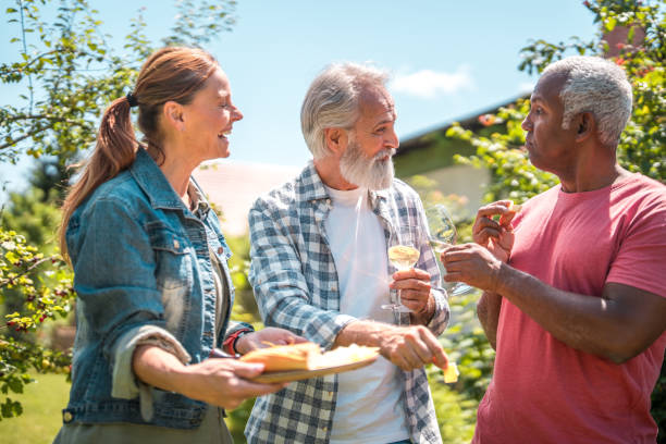 istock Happy Seniors' Joyful Gathering in the Backyard 1601038762