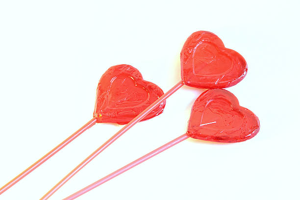 istock red lollipops in shape of heart 160104577