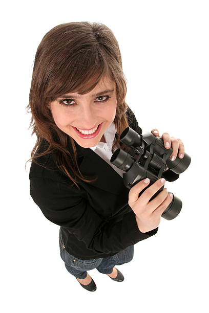 istock Businesswoman holding binoculars 160104674