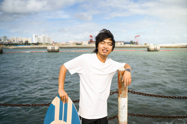 istock The boy who is going to surf and swim 1601047706