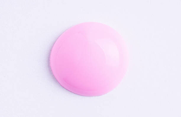 istock Pink cosmetic cream smear on white background. Face serum, lotion, moisturizer on white. Light pink paint swatch. Skincare product macro. 1601057956