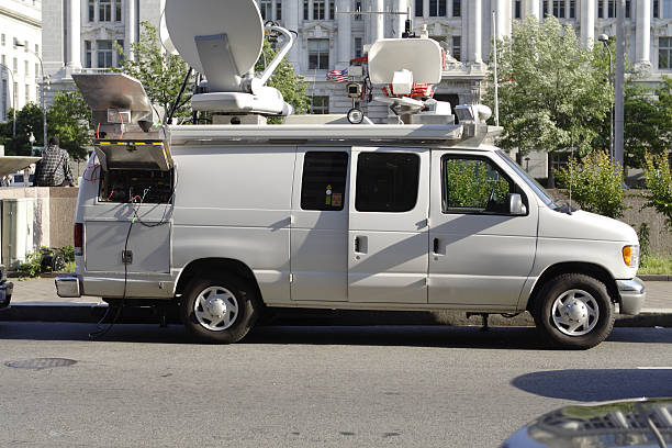istock News Van Satellite Dish Parked in Downtown Washington DC 160106670