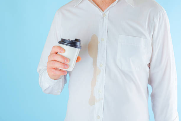 istock Dirty coffee stain on clothes 1601079184