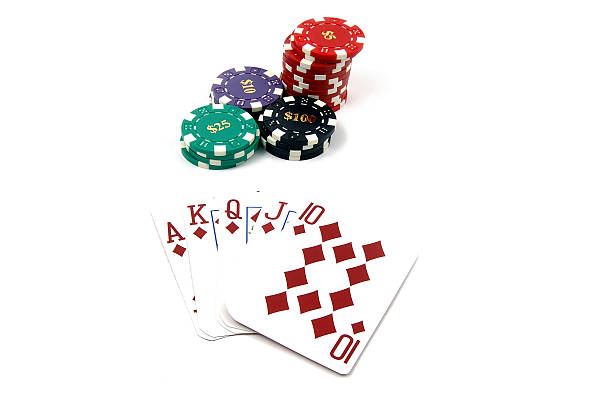 Royal Flush Diamonds One of the highest hands in poker a Diamonds Royal Flush with a pile of casino chipsisolated on white child gambling chip gambling poker stock pictures, royalty-free photos & images