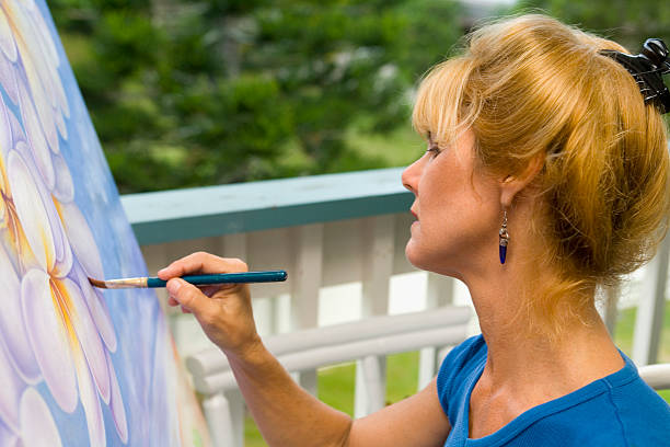 istock female artist painting 160111446