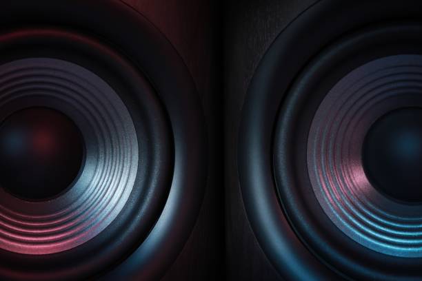 istock Modern sound speakers in neon light as background, closeup 1601117842