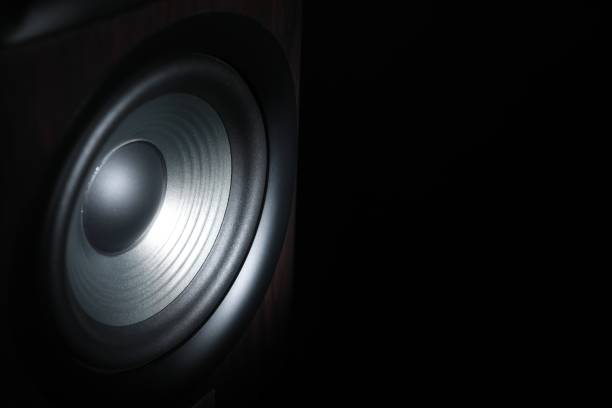istock One sound speaker on black background, closeup. Space for text 1601118452