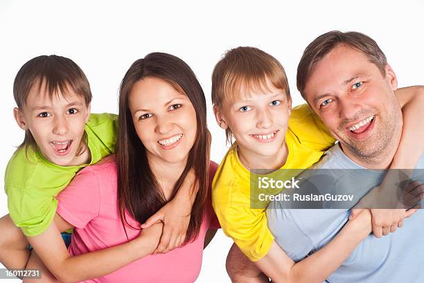Happy Family En Blanco Foto de stock y más banco de imágenes de Adulto - Adulto, Adulto de mediana edad, Belleza