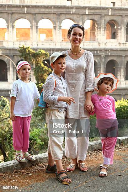 Mother Little Son And Two Daughters Are Near Colosseum Stock Photo - Download Image Now