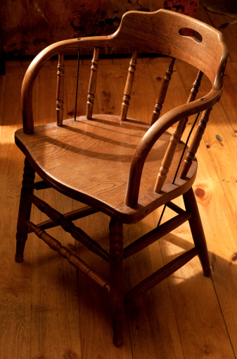 Antique bentwood chair on a wooden floor