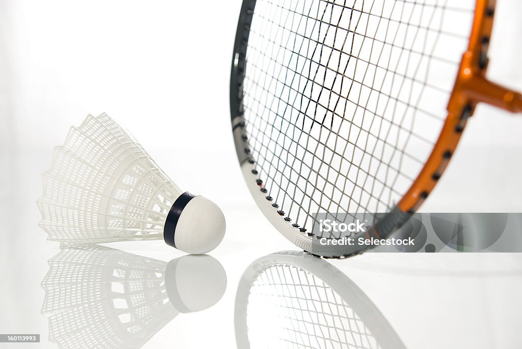 Badminton White shuttlecock and racket of badminton Badminton - Sport Stock Photo