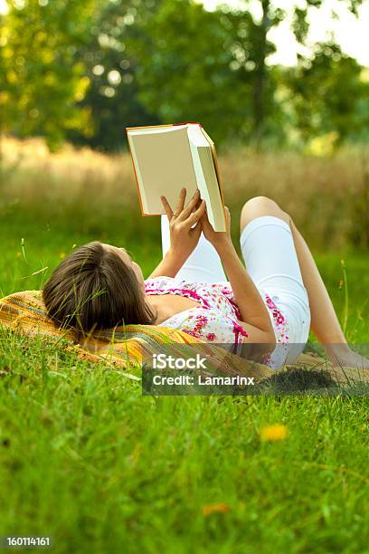 Beautiful Woman Relaxing In The Park Stock Photo - Download Image Now - Adult, Adults Only, Beautiful People