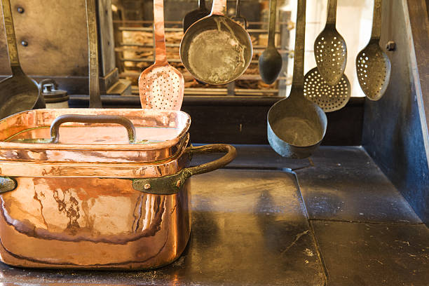 istock Antique Copper casserole and kitchen utensils 160114217