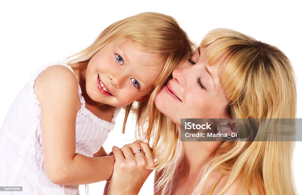 girl hugging her mother smiling girl hugging her mother Adult Stock Photo