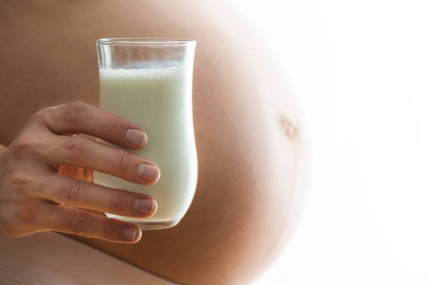 Free Stock Photo of Pregnant woman holding a glass of juice | Download ...