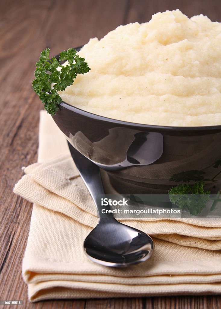 celery and potato puree bowl of puree and parsley Celery Stock Photo
