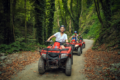 Outdoor Sports, Family, Friendship And Activity Lifestyle Having A Happy Day Using Atv