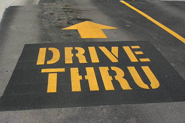 istock DRIVE THRU with arrow painted on a driveway 160118443