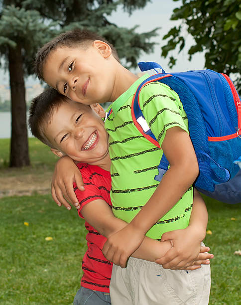 istock two boys are brothers in the arms 160118994