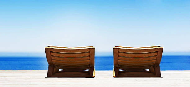 istock Beach chairs on perfect tropical sand 160119060