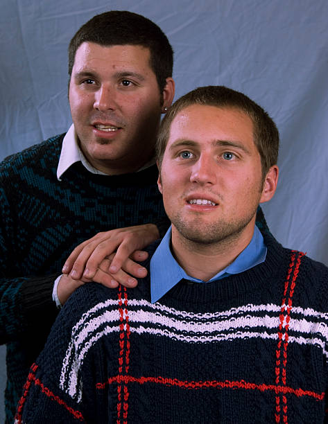 Brothers Brothers sitting silly embarrassment stock pictures, royalty-free photos & images