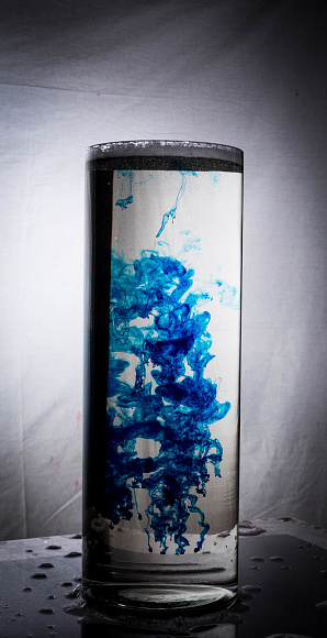 Azure Elixir presents a captivating visual narrative where color and liquid converge in a mesmerizing symphony. In this photograph, a container holds a vivid blue aquatic concoction, its depths seemingly unfathomable. The rich hue of the water casts an enchanting spell, evoking visions of hidden realms and secret potions.