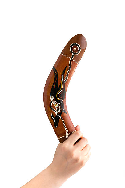 boomerang in mano - aborigine australian culture boomerang isolated foto e immagini stock