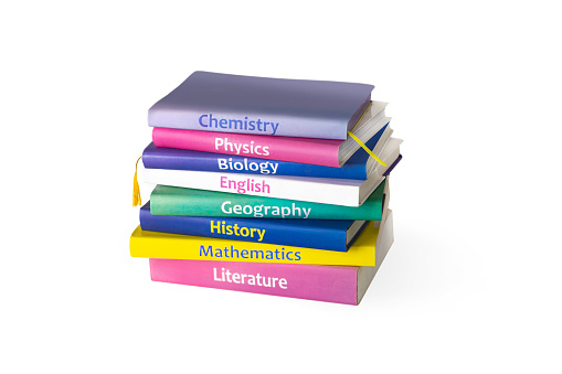 School colourfull textbooks isolated on white background. Basic school subjects mathematics, literature, physic,s chemistry