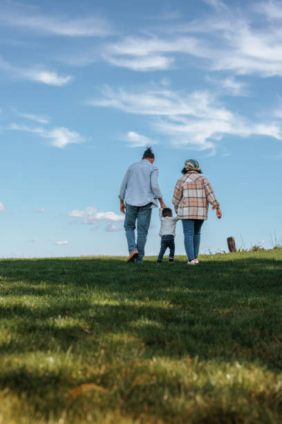 istock Family walking outside. 1601232424