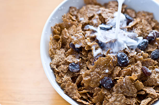 Raisin Cereal A raisin cereal with milk bran stock pictures, royalty-free photos & images