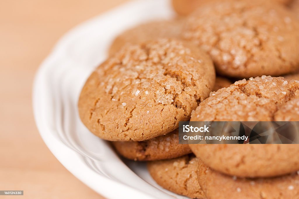 Molasses Cookies A dish of freshly baked molasses cookies, shallow depth of field. Baked Stock Photo