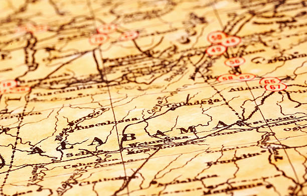 State of Alabama on a vintage map Vintage Map of Alabama alabama map stock pictures, royalty-free photos & images