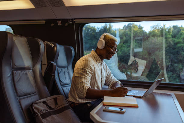 istock African American businessman in train 1601254311
