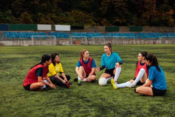 istock Female soccer team in field. 1601261692