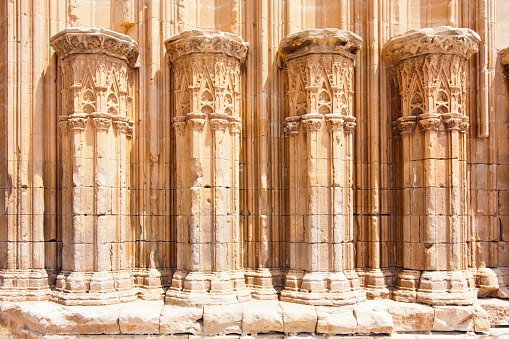 Archway columns in , ancient gothic and romanesque cathedral La Seu Vella, Lleida, Catalonia, Spain.