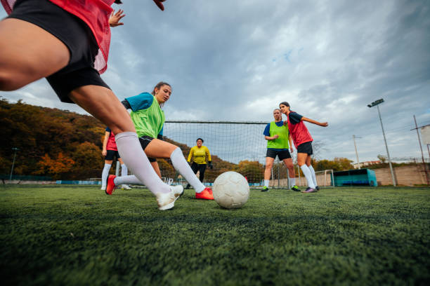 istock Female footbal player in action at practice. 1601285998