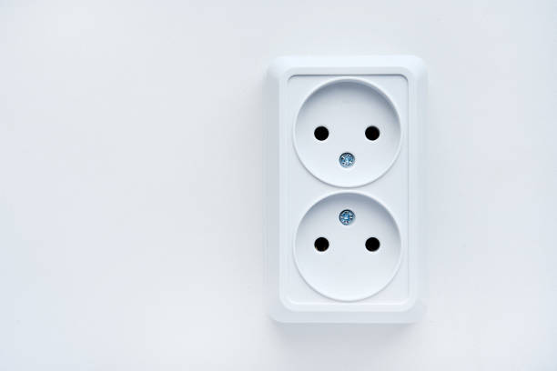 istock White double electrical outlet on a white background. Eurozette close-up. Electrical appliance. 1601295434