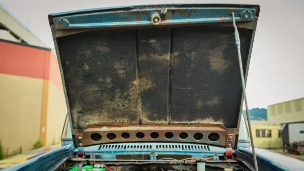 Showing the underside of a truck hood