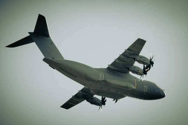 Close-up of a military  A400m Atlas aircraft in Europe, training in the air on a clear summer day.