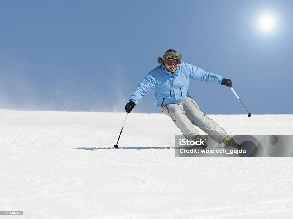 Skiing Male skiing downhill - space for text Activity Stock Photo