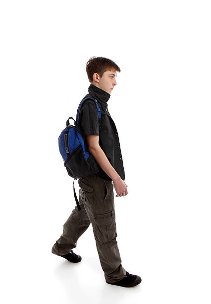 istock Student teenager walking 160135313