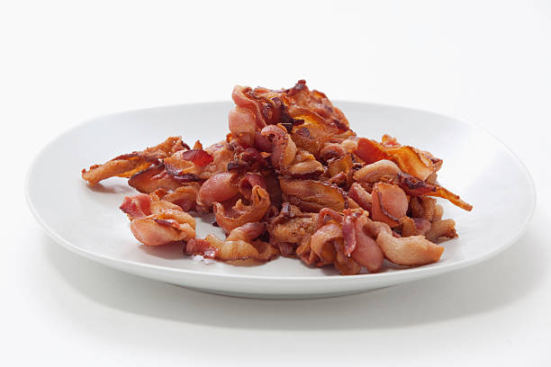 istock Plate of cooked bacon, ready to serve, copy space 160135395