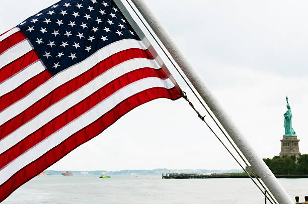 istock American Flag and Statue of Liberty 160136001