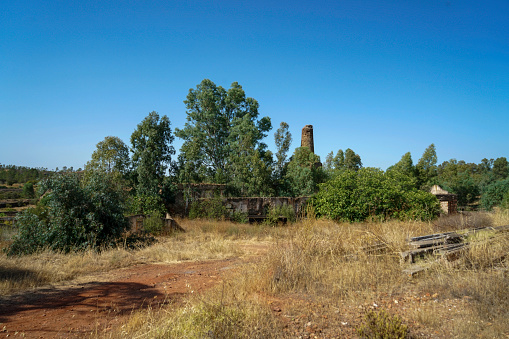 Abandoned village of a former copper and iron mine with poisoned earth and water