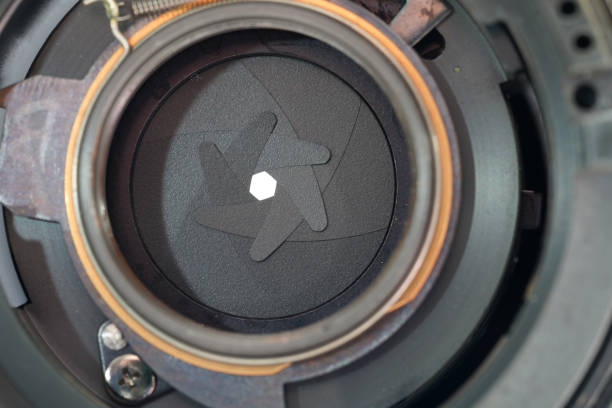 istock Camera lens with light and lens flare, close-up 1601365241