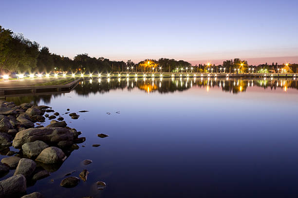 Wascana lake at night Beautiful Wascana lake on a quiet summer night regina stock pictures, royalty-free photos & images