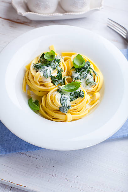 istock Tagliatelle Pasta with Blue Cheese Sauce and Spinach 160136595
