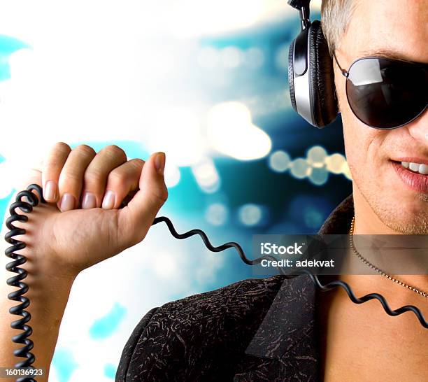 Boy Is Listening To Music Track Stock Photo - Download Image Now - Adult, Arts Culture and Entertainment, Audio Equipment