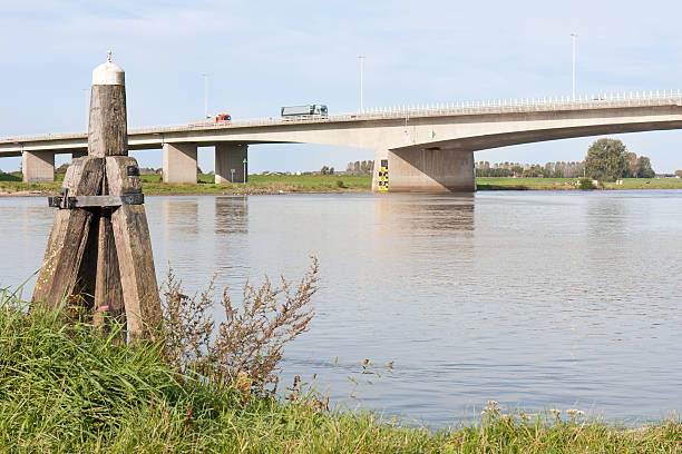istock Concrete bridge crossing river IJssel, the Netherlands 160137482